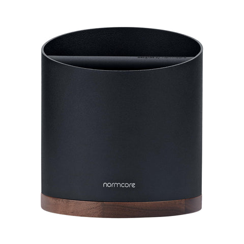 Normcore knock box interior angled to minimize splatter and keep counters clean.
