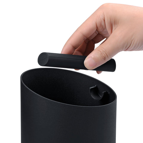 Normcore knock box features non-slip pads for stable use on busy countertops.