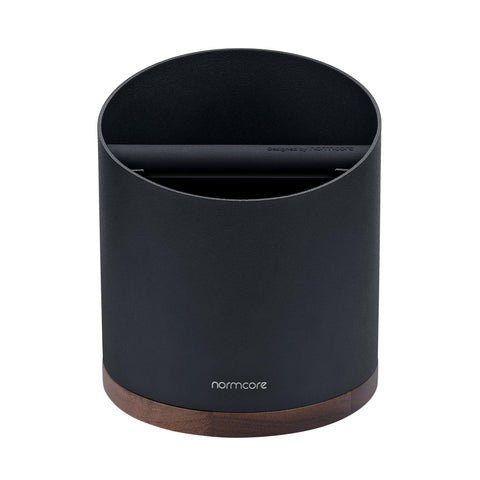 Normcore knock bar is soft and removable to dampen noise during pucks disposal.