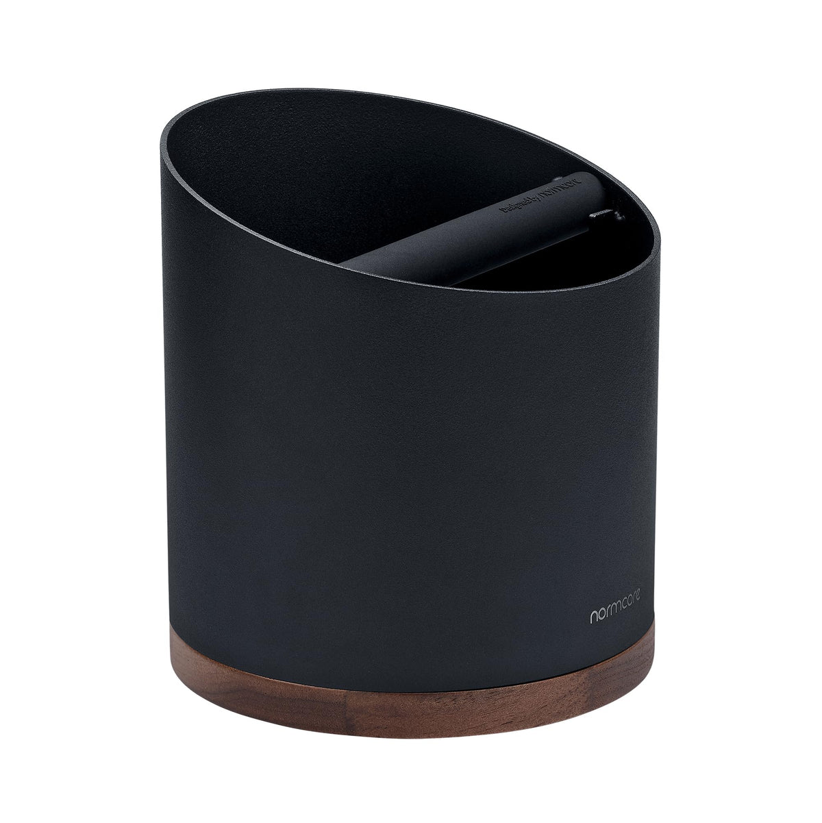 Normcore knock box with stainless steel barrel and walnut base for durable, elegant countertop use.