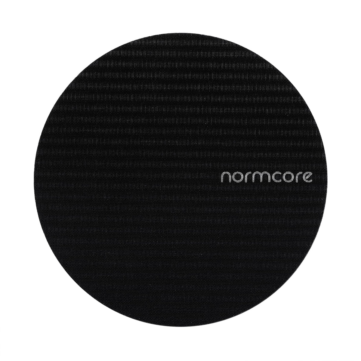 Normcore puck screen close-up with titanium PVD coating for durability