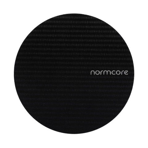 Normcore puck screen close-up with titanium PVD coating for durability