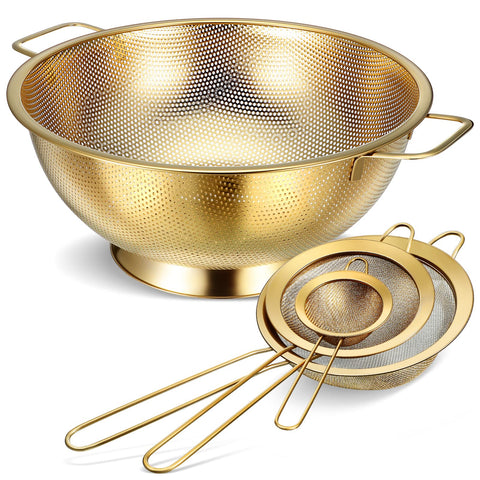Norme gold colander 5-quart with sturdy handle for easy pasta draining.