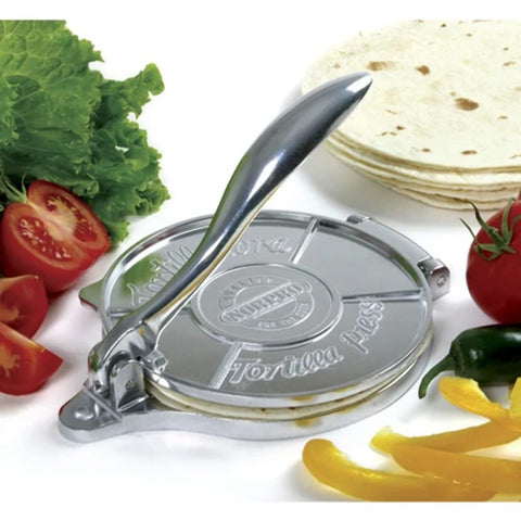 Norpro 6-inch tortilla press lever action in use, ideal for quick batches.