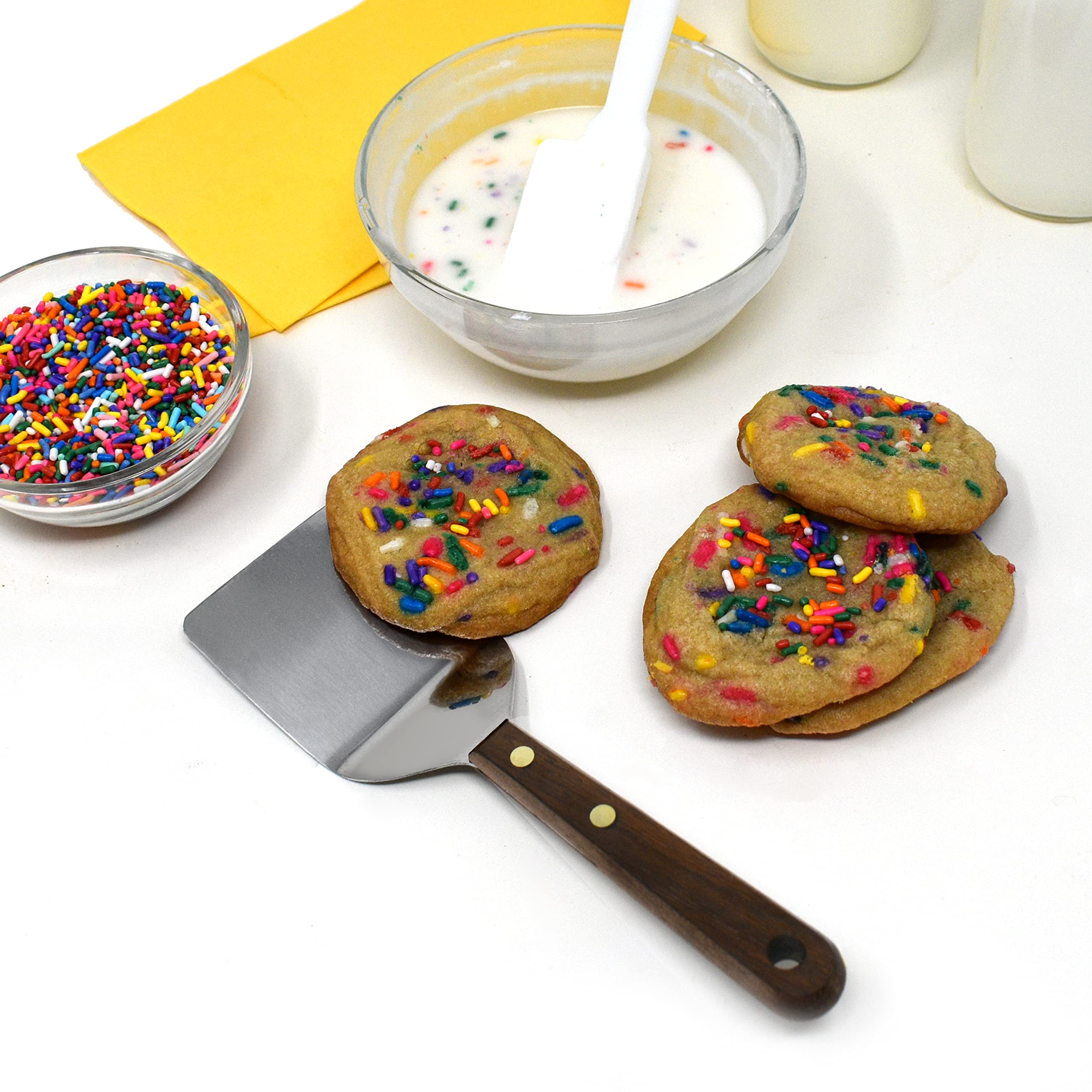 Norpro spatula flipping cookies on sheet for easy lifting