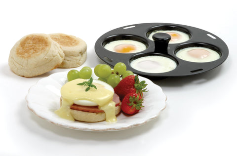 Norpro 992 nonstick poacher in pan enables four-egg cooking with minimal effort.