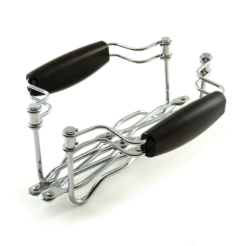 Norpro expanding trivet extended-length demonstrates reach up to 16 inches for large dishes.