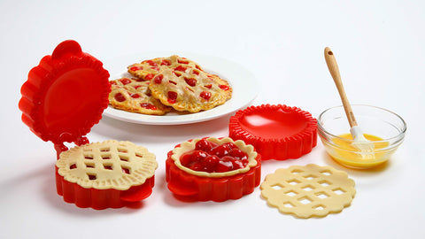 Norpro four mini pies ready to serve with lattice crust