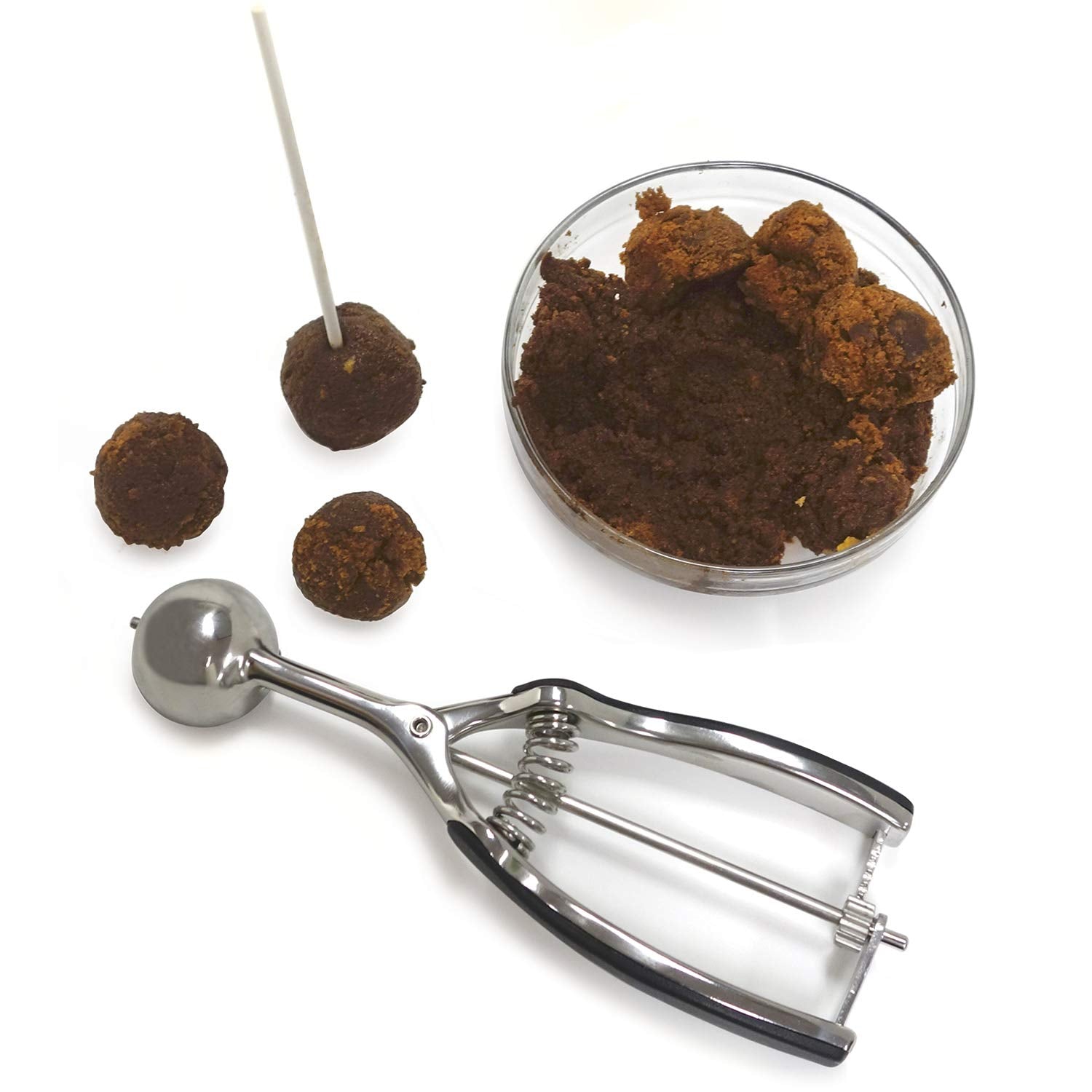 Norpro Grip-EZ stainless scoop demonstrates spring-action release for easy, uniform portions.