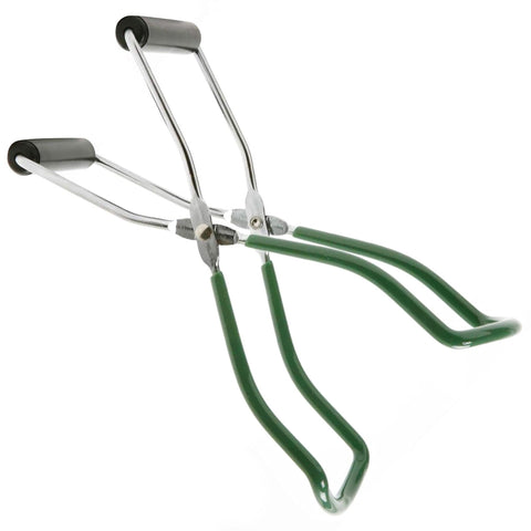 Norpro long tongs with green vinyl handles in use for sanitation.
