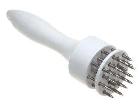 Norpro tenderizer in action showing heavy-prong tool breaking tough fibers.