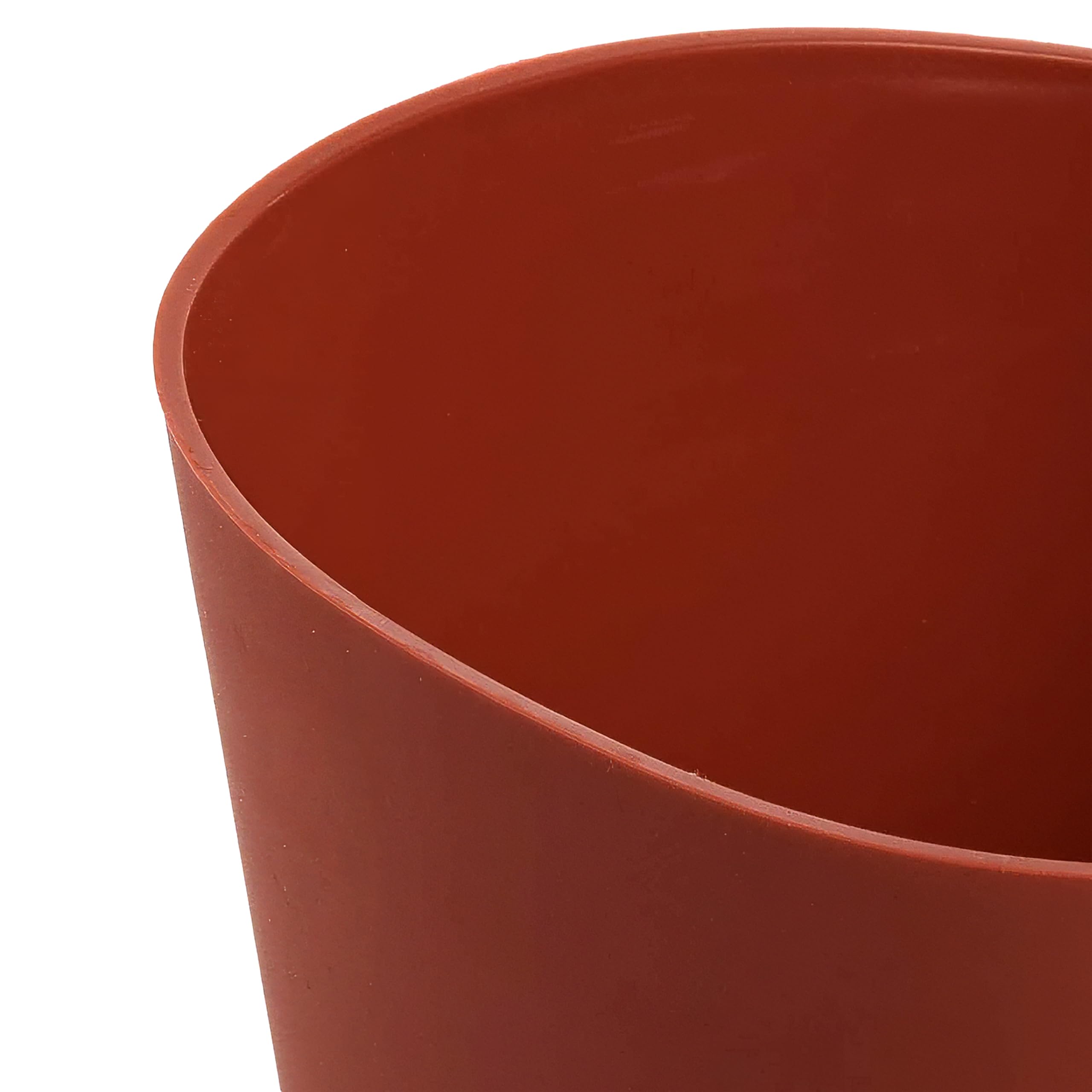 Norpro red bowls versatile for pouring into narrow mixers and molds.
