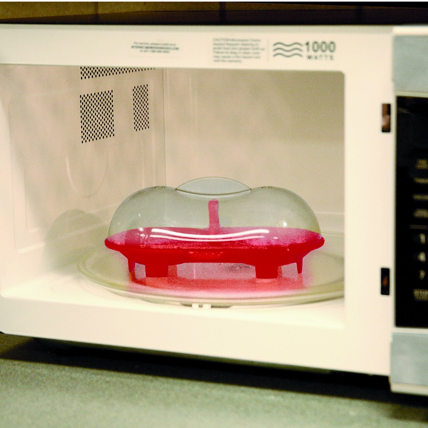 Norpro red poacher shows single or double portions for convenient breakfasts.