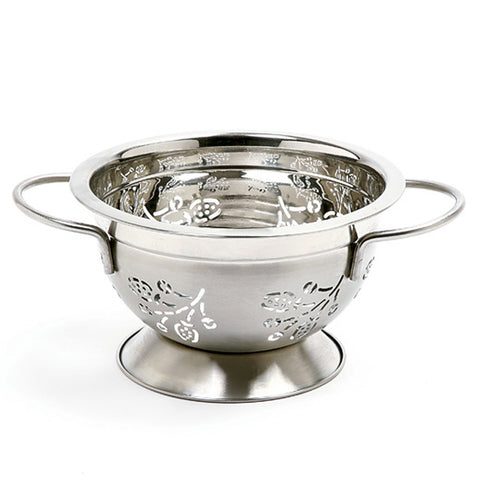 Norpro colander with strawberry cutouts for fast drainage and airflow.
