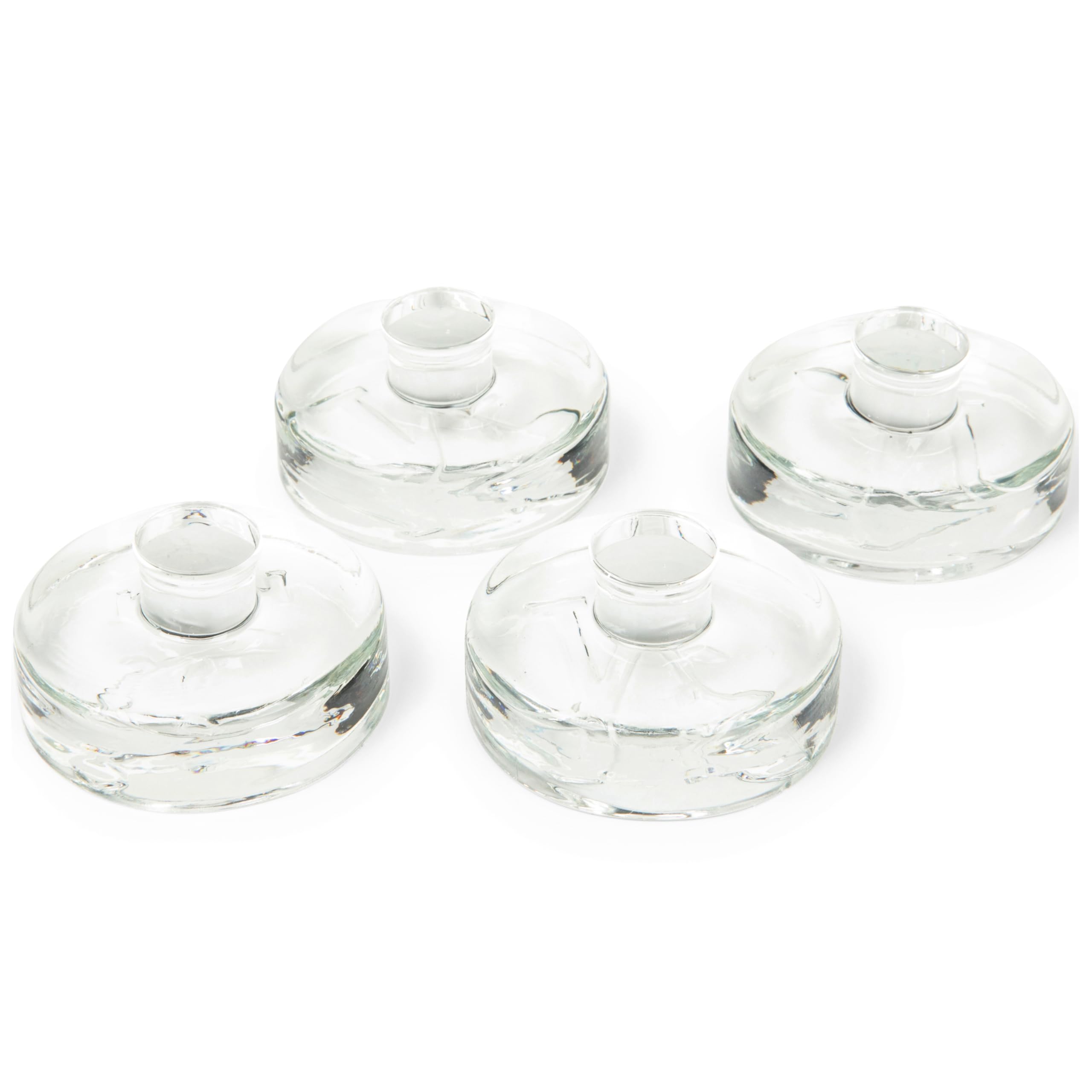 Nourished Essentials heavy glass weights with grooved handles ease fermentation in wide-mouth jars.