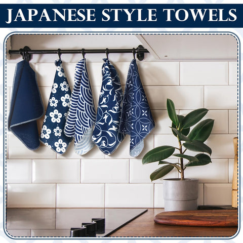 Noveread cotton kitchen napkins rolled neatly, blue patterns.