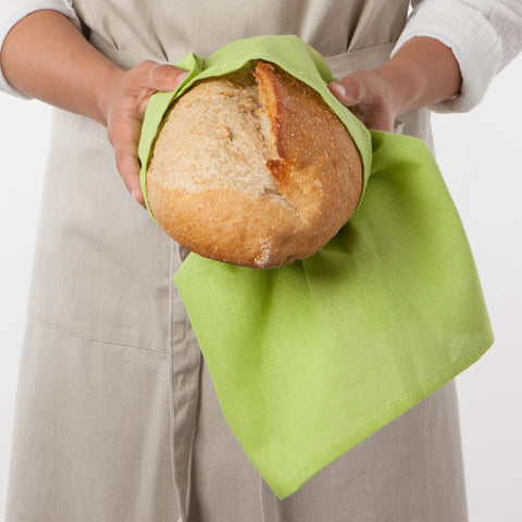 Now Designs flour sack towel chartreuse-turquoise-leaf pattern drying dishes with lint-free finish