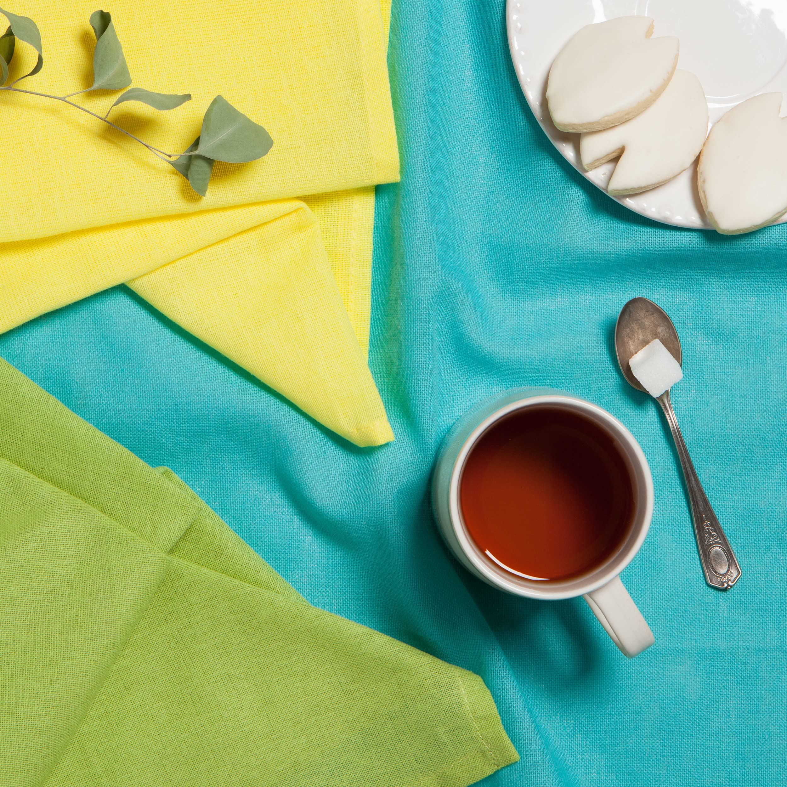 Now Designs flour sack towel chartreuse-turquoise-leaf pattern used to pat greens and fruit
