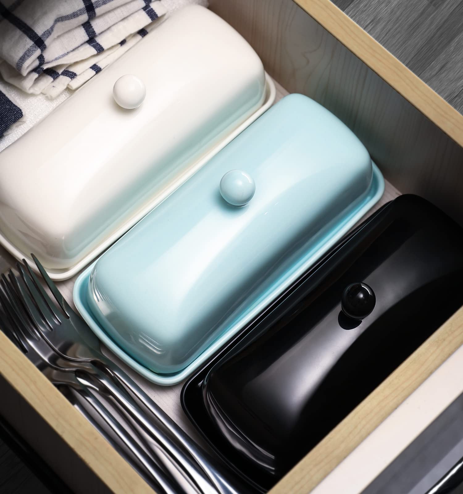 Nucookery butter dish white porcelain blends with any tableware style.