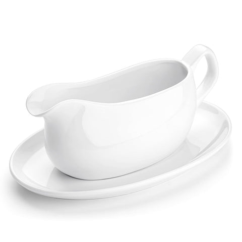 Nucookery white porcelain gravy boat with 14oz capacity for controlled pouring.