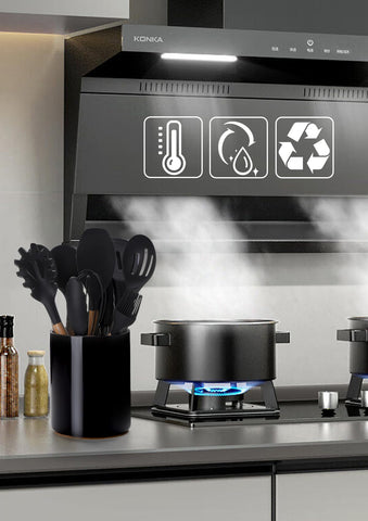 Nucookery utensil holder on counter with utensils for accessibility.