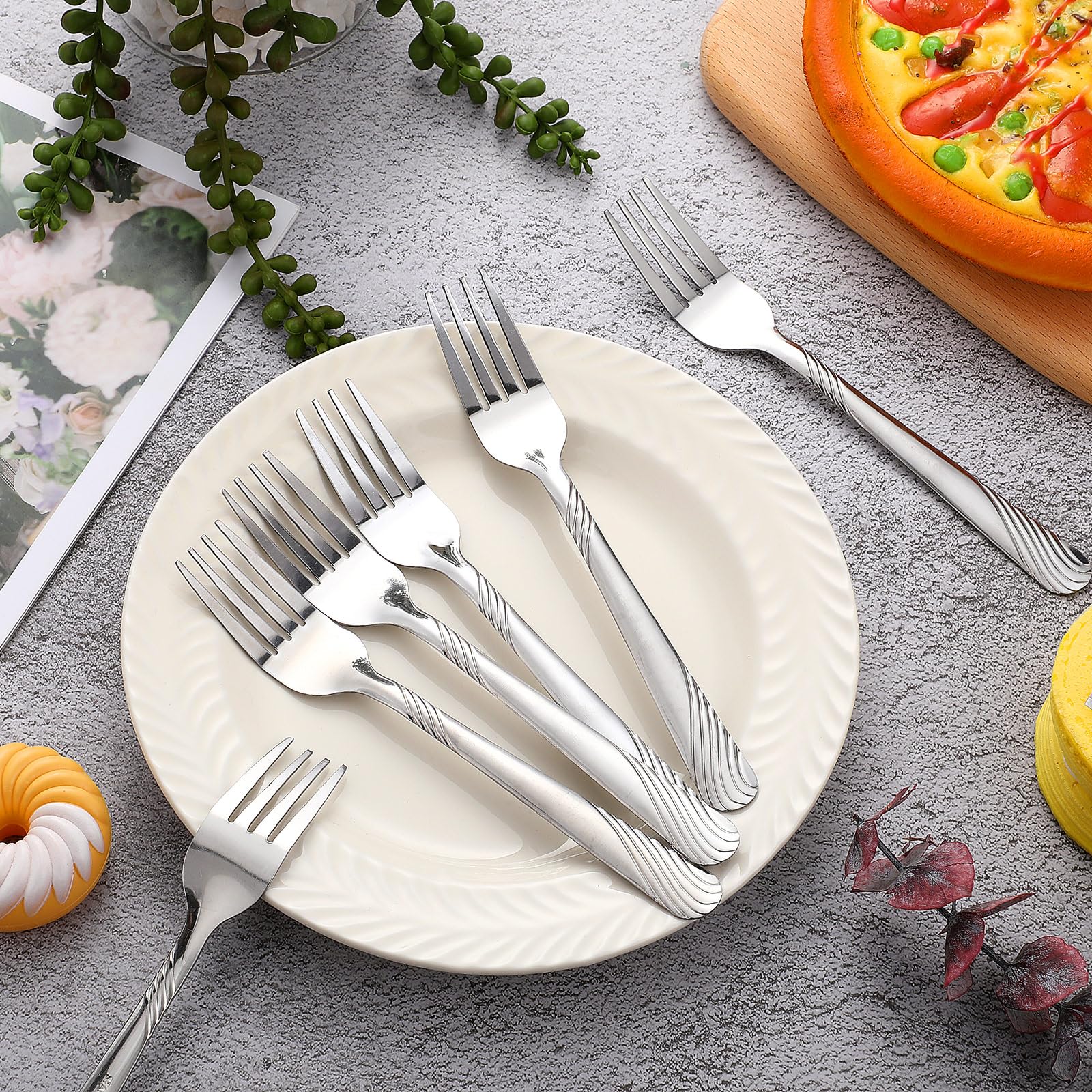 Ergonomic forks and spoons offer comfortable grip during meals.