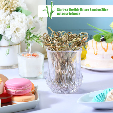Nuogo fruit and dessert skewers enhance displays on platters.