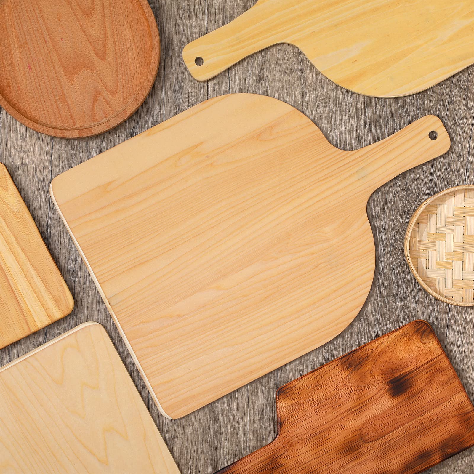 Nuogo close-up of natural wood texture on pizza paddle.
