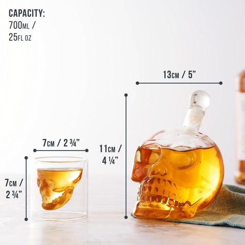 Skull decanter with lid in a contemporary bar setup.