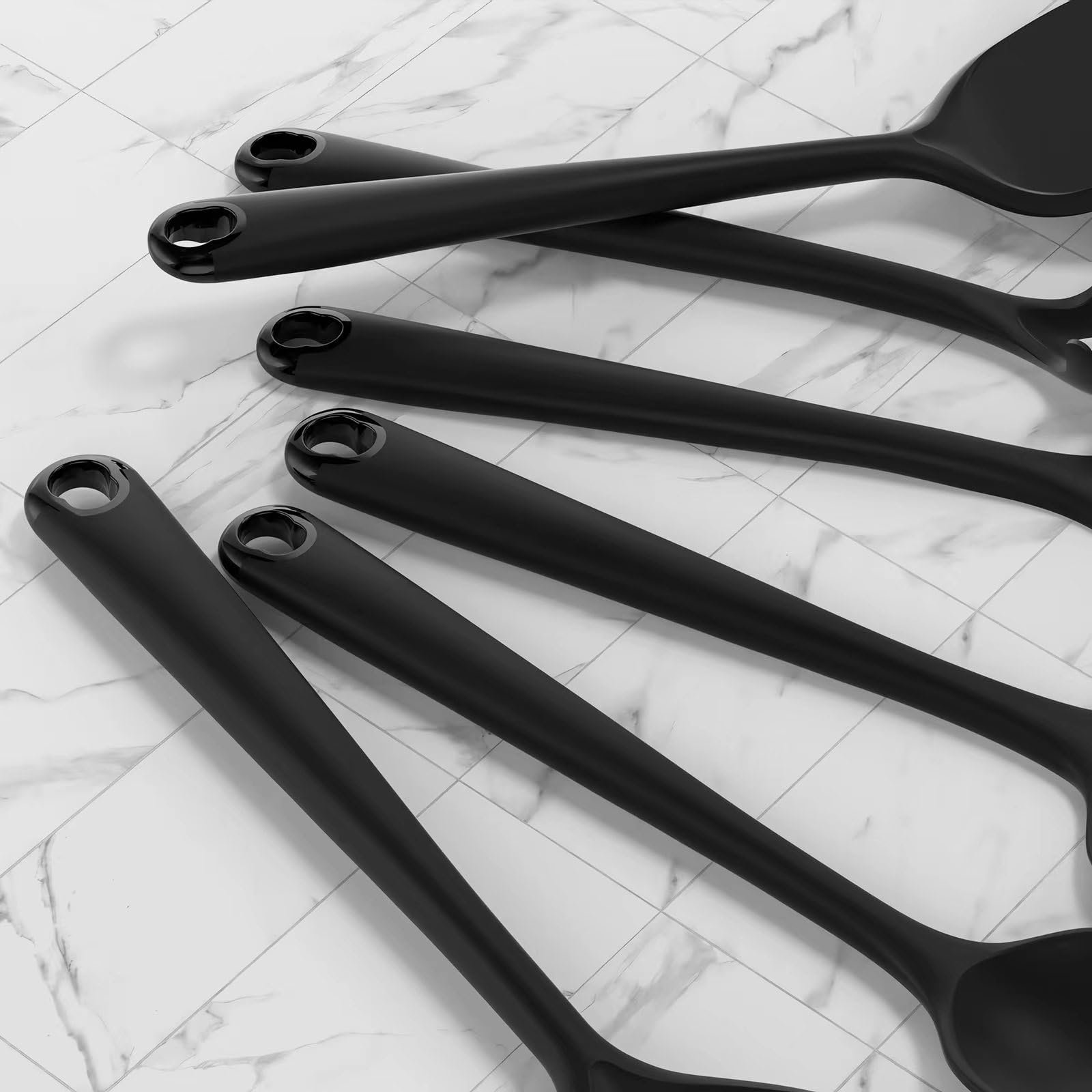 Oannao cleaning brush helps keep utensils spotless after cooking.