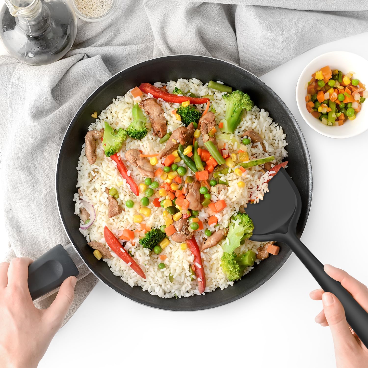 Oannao slotted spoon draining vegetables without splashing or mess.