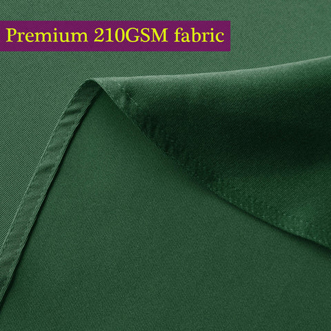 Obstal Christmas table setting with green cloth showcasing versatile holiday styling.
