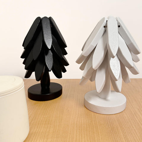 OFCTE trivet unfolding action showcases gravity-assisted setup for easy use