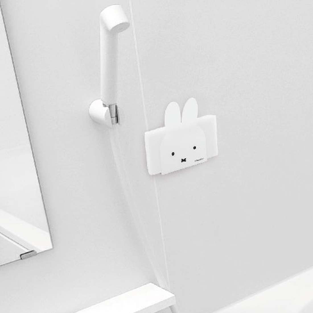 Okato Miffy magnet sponge holder attaches securely to refrigerators with a rubber magnet for organization.