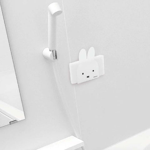 Okato Miffy magnet sponge holder attaches securely to refrigerators with a rubber magnet for organization.