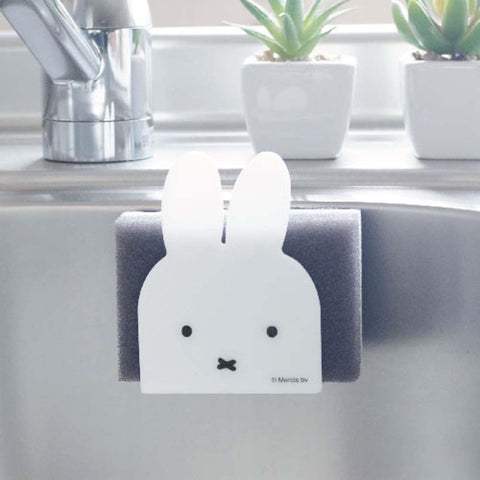 Okato Miffy magnet sponge holder's bottom drainage gaps promote hygienic drying after use.