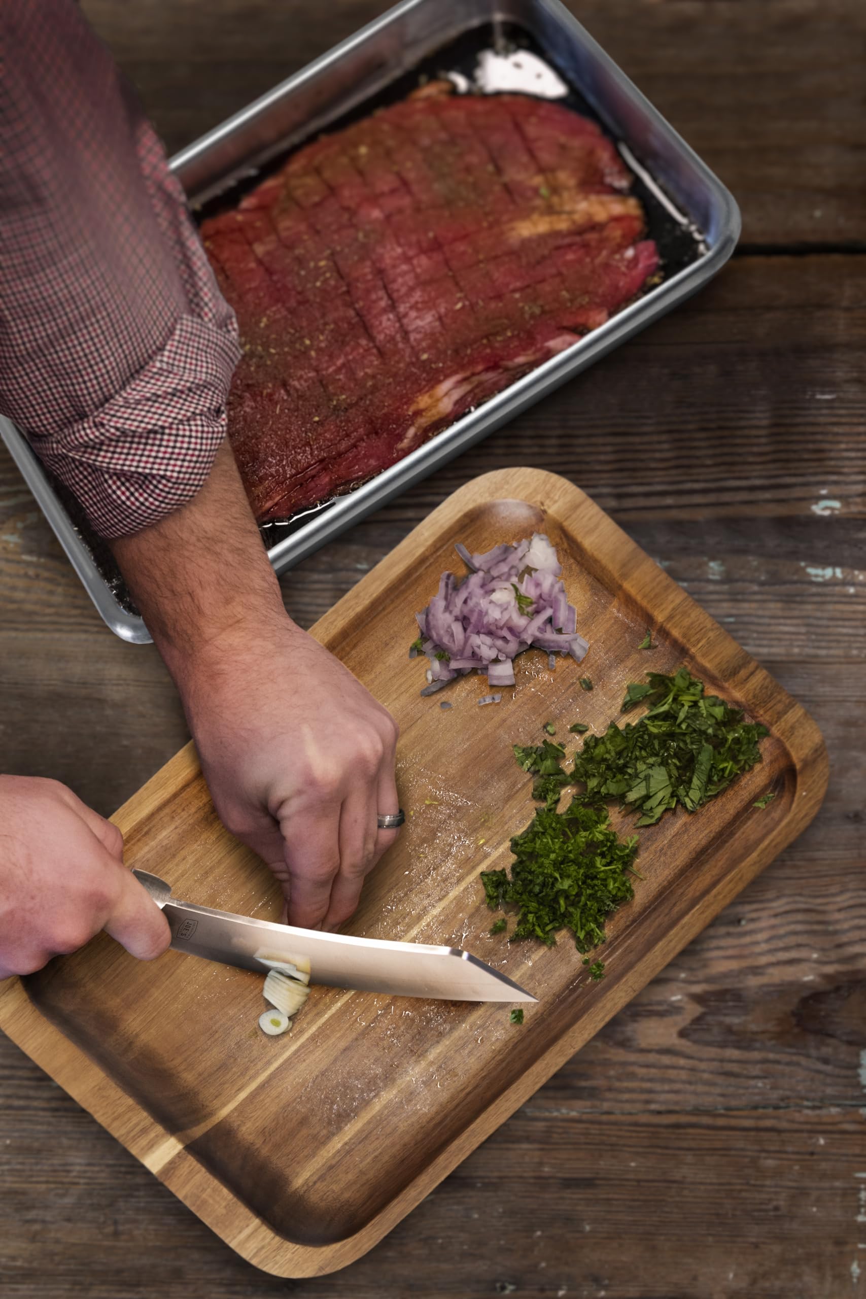 Oklahoma Joe's Blacksmith knife with brushed finish and rugged look