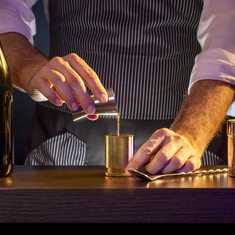 Old Southern Brass 50-cal bullet design ceramic shot glass.