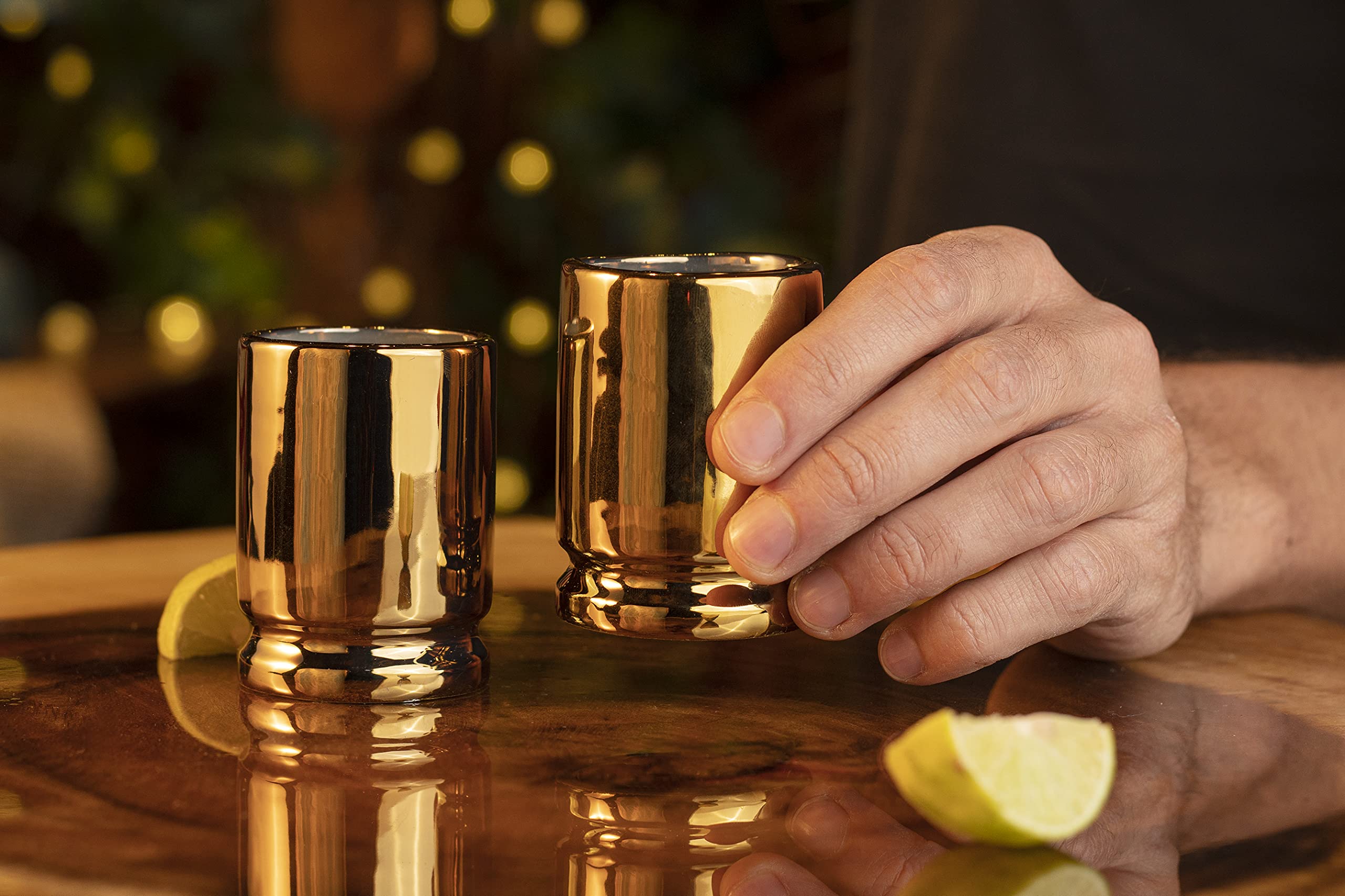 Old Southern Brass 2-ounce capacity supports measured pours during games and gatherings.