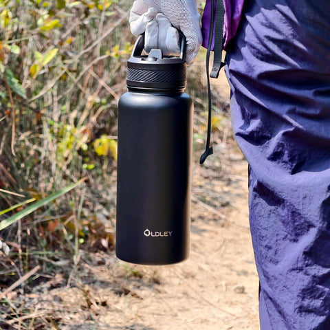 OLDLEY black 32 oz insulated bottle for reliable temperature retention.