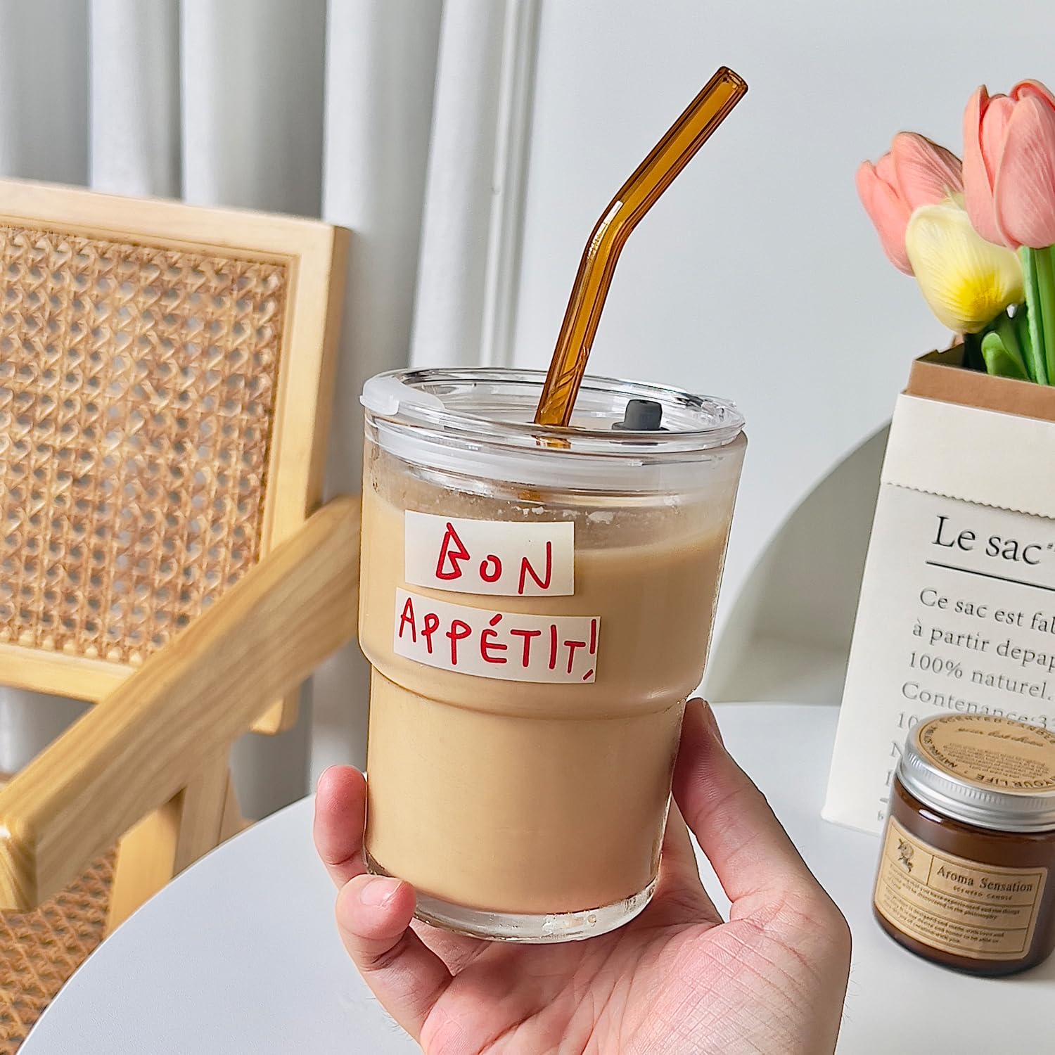 Olvini clear glass tumbler showcasing beverage color for coffee or tea
