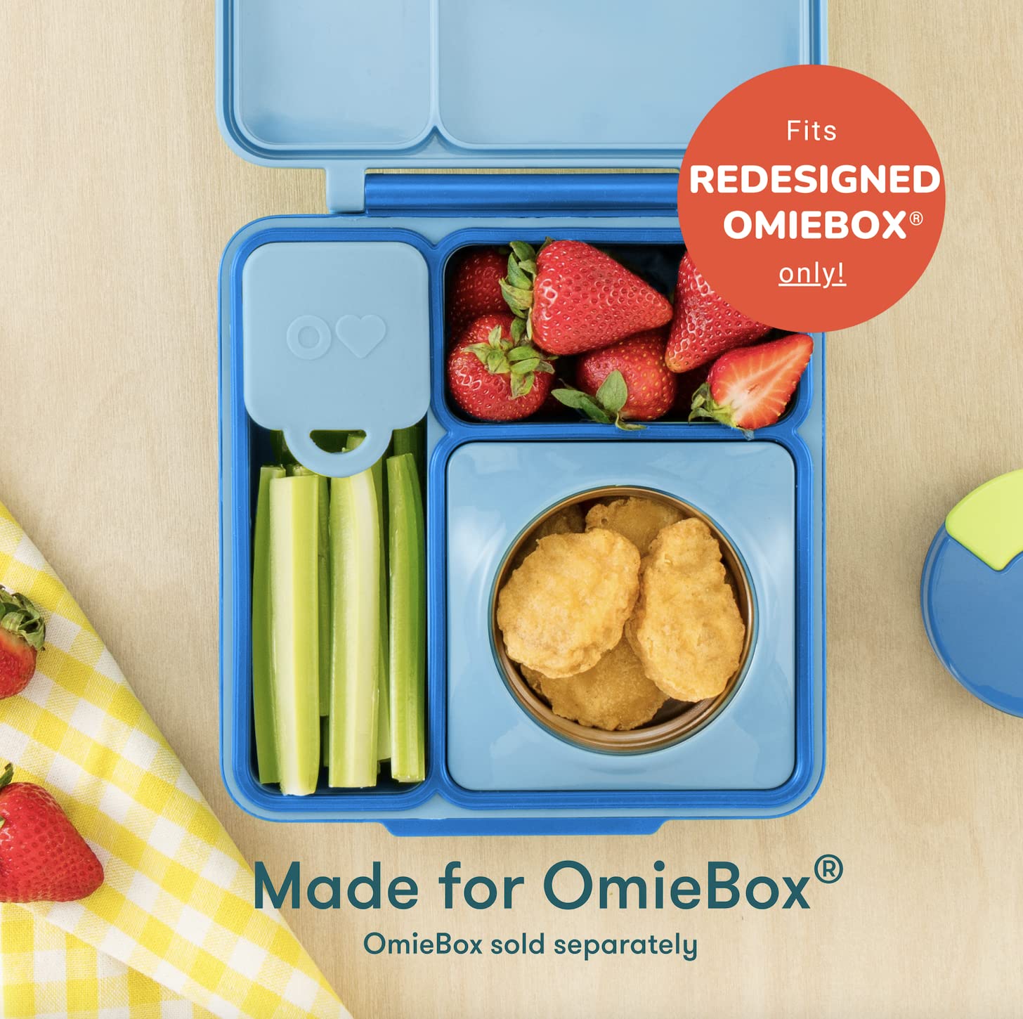 Close-up of OmieBox dip container's long compartment showing capacity for three dips.