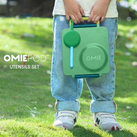 Close-up of nested OmieBox utensils inside the mint pod.