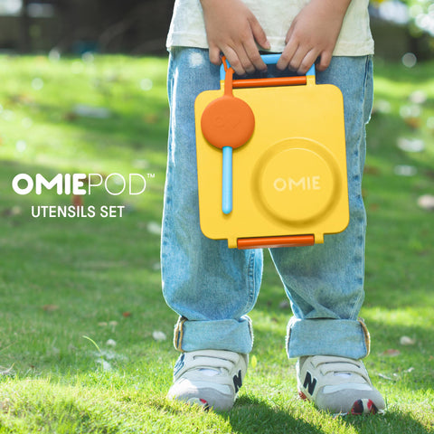 OmieBox spoon nested in pod for quick school lunches.