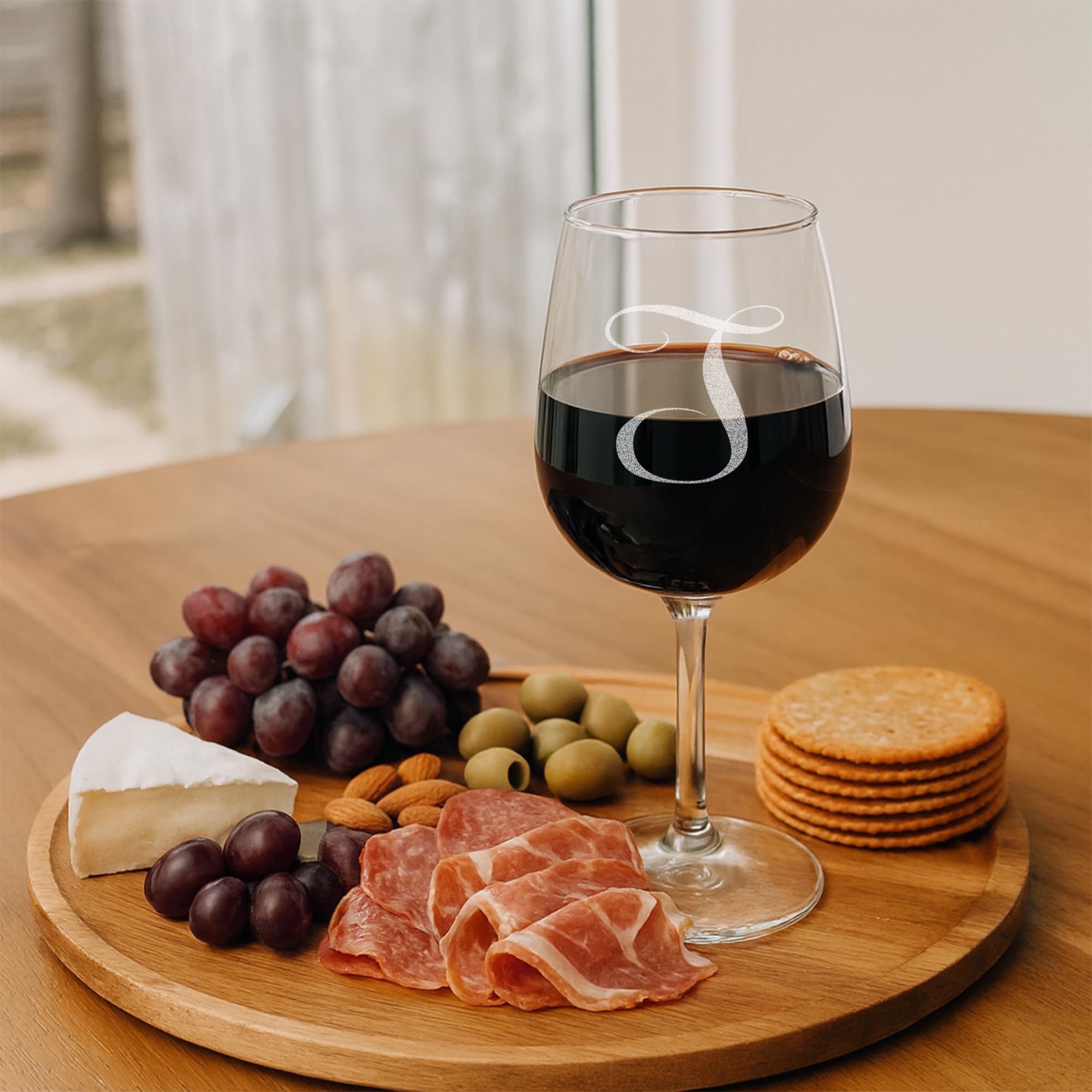 On The Rox Drinks red wine served in a monogram glass for aroma and color.