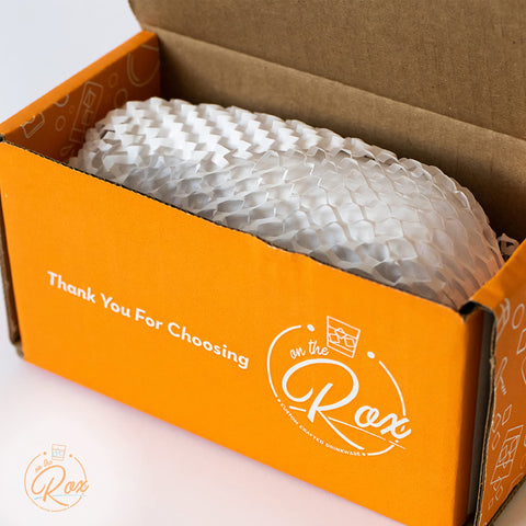 On The Rox monogram beer glass in hand shows comfortable grip