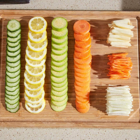 ONCE FOR ALL adjustable thickness knob enables precise slicing from thin to thick
