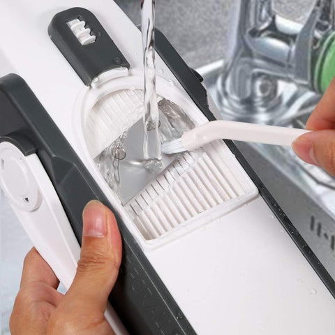 ONCE FOR ALL Safe Mandoline Slicer included cleaning brush for residue removal.