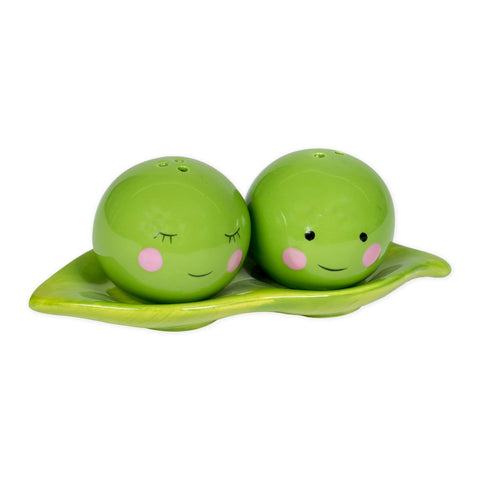 One Hundred 80 Degrees table display with green ceramic peas in a pod collection.