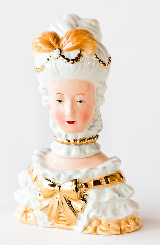 One Hundred 80 Degrees Marie Antoinette salt and pepper shaker set on kitchen counter, magnetically linked and decorative.